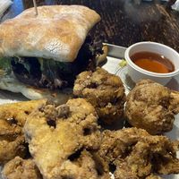 Sass burger (vege pattie, lettuce, aioli, vegan cheese, mushrooms, avo) and cauliflower with maple syrup  at Bacon Brothers in Christchurch