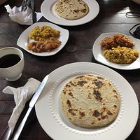 Coconut Rotty with Lentil Dahl and Onion Chutney for breakfast  at Sri Dhara Restaurant  in Unawatuna