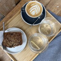 banana bread & cappuccino w/ pea milk  at Kafe Friedrich in Brno