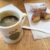 Coffe and donuts seated in the shop at Stan's Donuts and Coffee - South Loop in Chicago