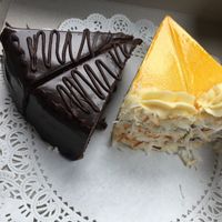 Chocolate raspberry gran marnier cake, lillikoi coconut cream cake. Both vegan! at Kilauea Bakery and Pau Hana Pizza in Kilauea