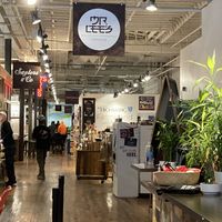The noodle shop sign & cash register stand (where the plant is). at Mister Lee's Noodles in Easton