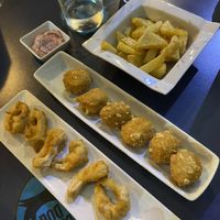 Calamares, croquetas (buenisimas) y patatas bravas at Sa Capca in Blanes