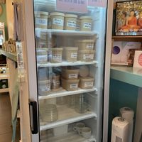 Fridge with take away boxess  at Eisdielerin in Cologne