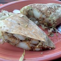 Nov.3, 2025 Tried Vegan Potato Chorizo Burrito. I also had a Elderflower Margarita. They also offered a dog bowl of water and I ordered a dog burger. at Cantina Azteca in Carmichael