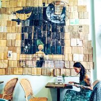 Reading all their books at Passengers in Ho Chi Minh City