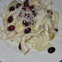 Sad and dry fennel salad with olives and parmasan at Ristoro Dantesca in Pisa