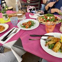 Only tomatoes in the middle of the table and dish on the right are vegans!  at Ristoro Dantesca in Pisa