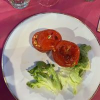 Baked tomatoes (secondi) with a very sad and limp salad on the side   at Ristoro Dantesca in Pisa
