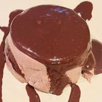 Panna cotta al cioccolato con riduzione di cacao amaro  at Ristoro Dantesca in Pisa