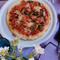 Pizza with vegan cheese and salsiccia at Ristoro Dantesca in Pisa