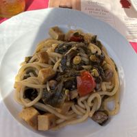 Non vongole pasta with seitan, seaweed and pistachios   at Ristoro Dantesca in Pisa