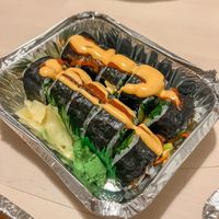 Vegan roll- Spinach, carrots, mushrooms, oshinko and zucchini topped with sriracha & v spicy mayo at Kogi Bar & Grill in Plymouth