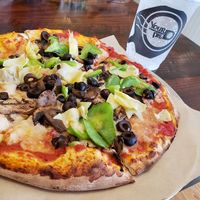 Personal pizza with marinara, daiya moz, artichoke hearts, mushrooms, black olives, and green peppers. at Your Pie in Clarkesville