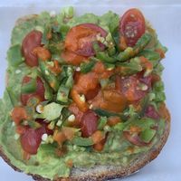 Spicy avocado toast... this sh!t is SPICY I DO NOT RECOMMEND FOR PEOPLE WITH A LOW SPICE TOLERANCE!!!!! My lips are 🥵 burning  at Thrive Juice Cafe in Arlington