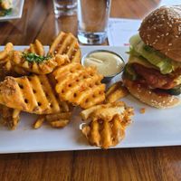 Buffalo sandwich with waffle fries at O'cado in Sherman Oaks