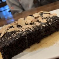 Decadent chocolate cake with almonds and caramel...soooo good! at O'cado in Sherman Oaks