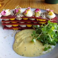 Beet millefeuille salad with passionfruit and herb foam at Orteá - Vegan Collective in Lisbon