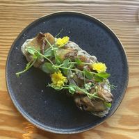 Bruschetta with cream cheese, pears, mushrooms and cilantro pearls  at Orteá - Vegan Collective in Lisbon