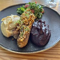Tempeh with hummus and beetroot mash  at Orteá - Vegan Collective in Lisbon