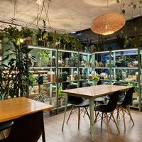 Interior. It’s got a lot of plants as decor!  at Orteá - Vegan Collective in Lisbon