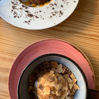 Chocolate mousse and roasted peaches, crumble and homemade ice cream skillet at Orteá - Vegan Collective in Lisbon