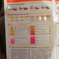 Photos of the menu which includes a non-animal based vegetarian curry that can be combined with a range of options to make your preffered curry. at CoCo Ichibanya - Keihan Shichijo in Kyoto