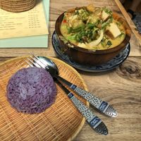 Purple rice and green curry  at The Family Restaurant in Bangkok