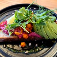 Pink houmous and avocado on sourdough at Bean and Bread in Abergavenny