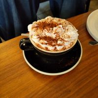 Hot chocolate vegan squirty cream at Bean and Bread in Abergavenny