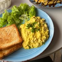 Scrambled tofu with toast  at Cakester Cafe in Krakow