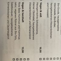 Vegan breakfast: one sweet with chocolate and Fruits and more… and one with hummus, beet root, salad and roll (and more)  at Cafe Sehnsucht in Cologne