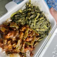 Take away box with curry, veg and rice   at Krsna's Free Meals in Central Singapore