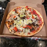 Medium veggie pizza with olives artichokes fresh basil, roasted bell pepper, vegan cheese and vegan sausage.  at Mod Pizza in Cerritos