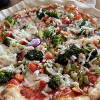 Vegan cheese, jalapeños, red onion, roasted broccoli, garlic, bell pepper and diced tomato - so good!! at Mod Pizza in Westminster