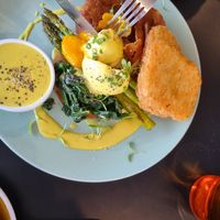 Benny with poached eggs and hash browns at Crux in Semaphore