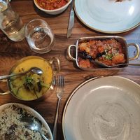 Gluten free Aubergine Alok in the middle, gluten-free Vegetable Korma on the centre left, gluten free mushroom rice on the lower left, vegetable jalfrezi on the upper left at Everest Inn in Ashford