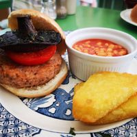 Brekkie Stack with a side of baked beans and hash browns at The Greenhouse Cafe in Felixstowe