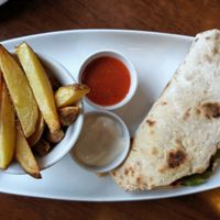 Wild rice tortilla, hand-cut chips, ketchup and mayo homemade at The Electric Vegan in Dublin