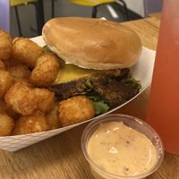 Regular Burger with tots and fresh lemonade with flavors. Also extremely delicious   at Rutabagas in Lincoln