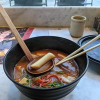 This bowl of lovelyness (korean dumplings, if memory serves) was spicy in all the right ways! at Wagamama - Bankside in London