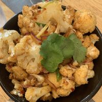 Cauliflower wings appetizer   at Wagamama in Bury St Edmunds