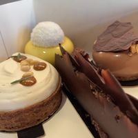 Tartelettes: 1. mango, 2. rosemary, 3. nuts, and a soft eclair made of mousse au chocolat  at Oh Faon in Marseille