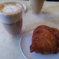 Chai oat latte and croissant at Oh Faon in Marseille