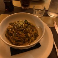 Stufato di verdure miste di stagione servito su tortino di patate gratinato al forno con paprika dolce e pistacchi   at Kowalski in Genoa