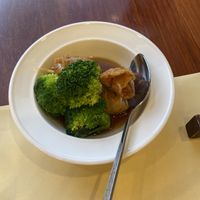 Delicious braised bean curd w broccoli and enoki mushrooms!  at Chi Lin Vegetarian in Kowloon