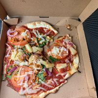 Spinach, pineapple, onions, and tomatoes  at Mod Pizza in Indian Trail