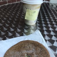 Small latte with oat milk and vegan ginger cookie  at Ula Cafe in Jamaica Plain