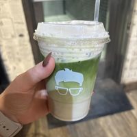 Blueberry matcha with vegan butter pecan cold foam  at Gregory's Coffee - 8th Ave in New York City