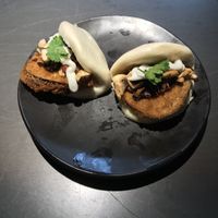 Panko coated aubergine & mixed mushroom bao buns. at Wagamama in Chichester